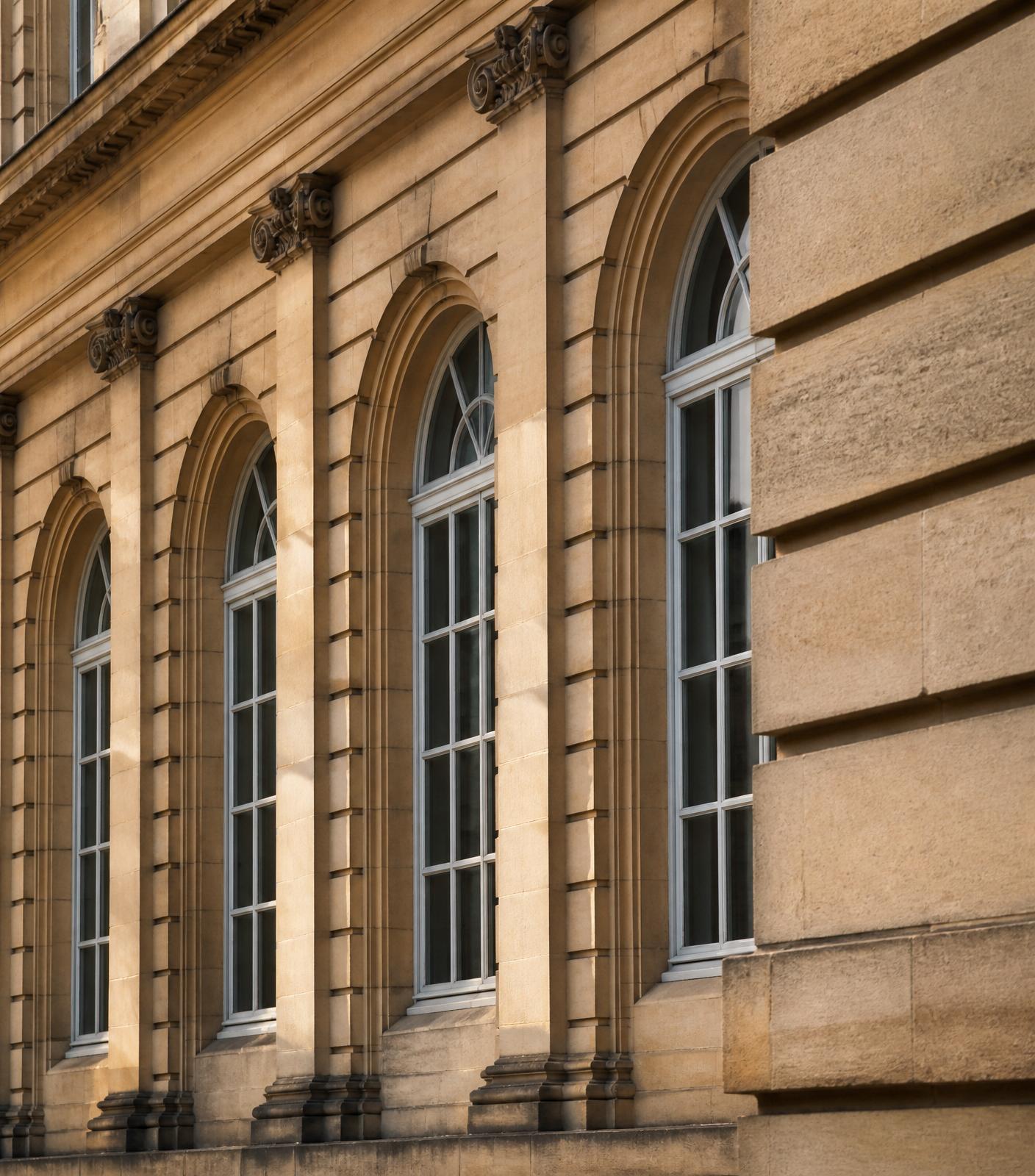 Classical Luxembourg stone facade with arched windows